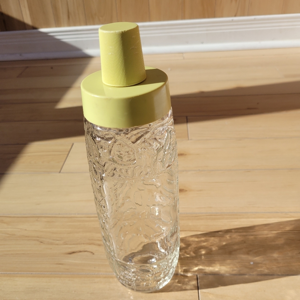Vintage 60's glass Shaker bottle with plastic yellow bottletop